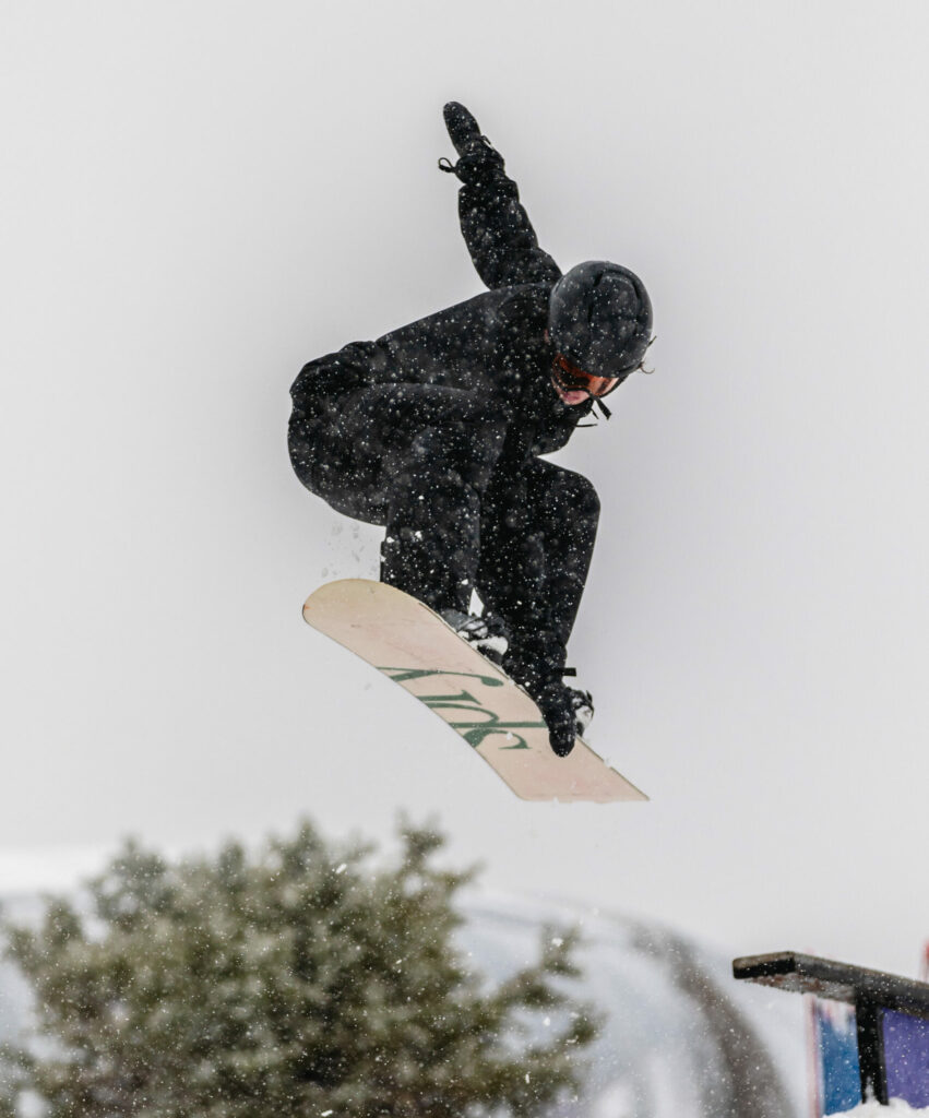 Snowboarding jump at a snow park